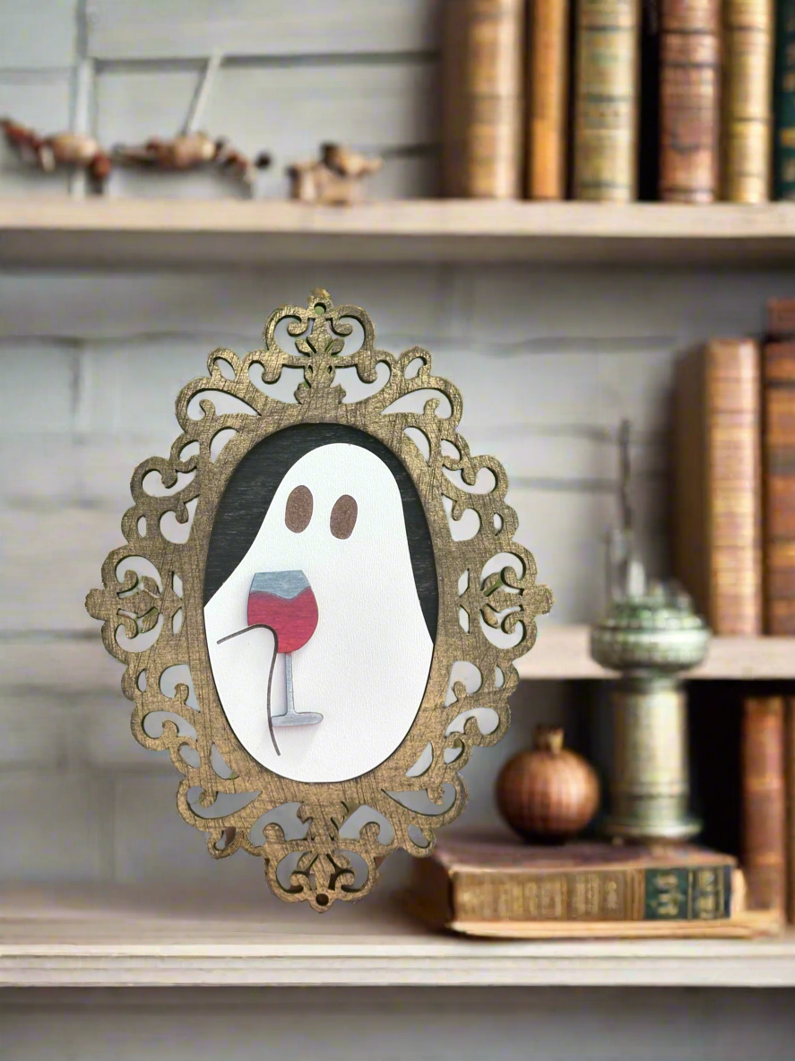 Spooky ghost silhouettes with decorative frames