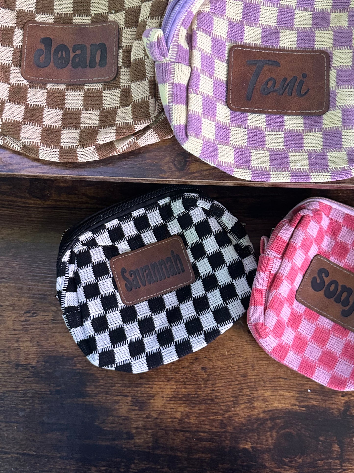 Checkered print bag with custom leather patch