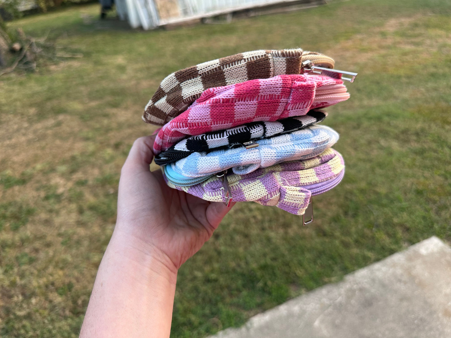 Checkered print bag with custom leather patch