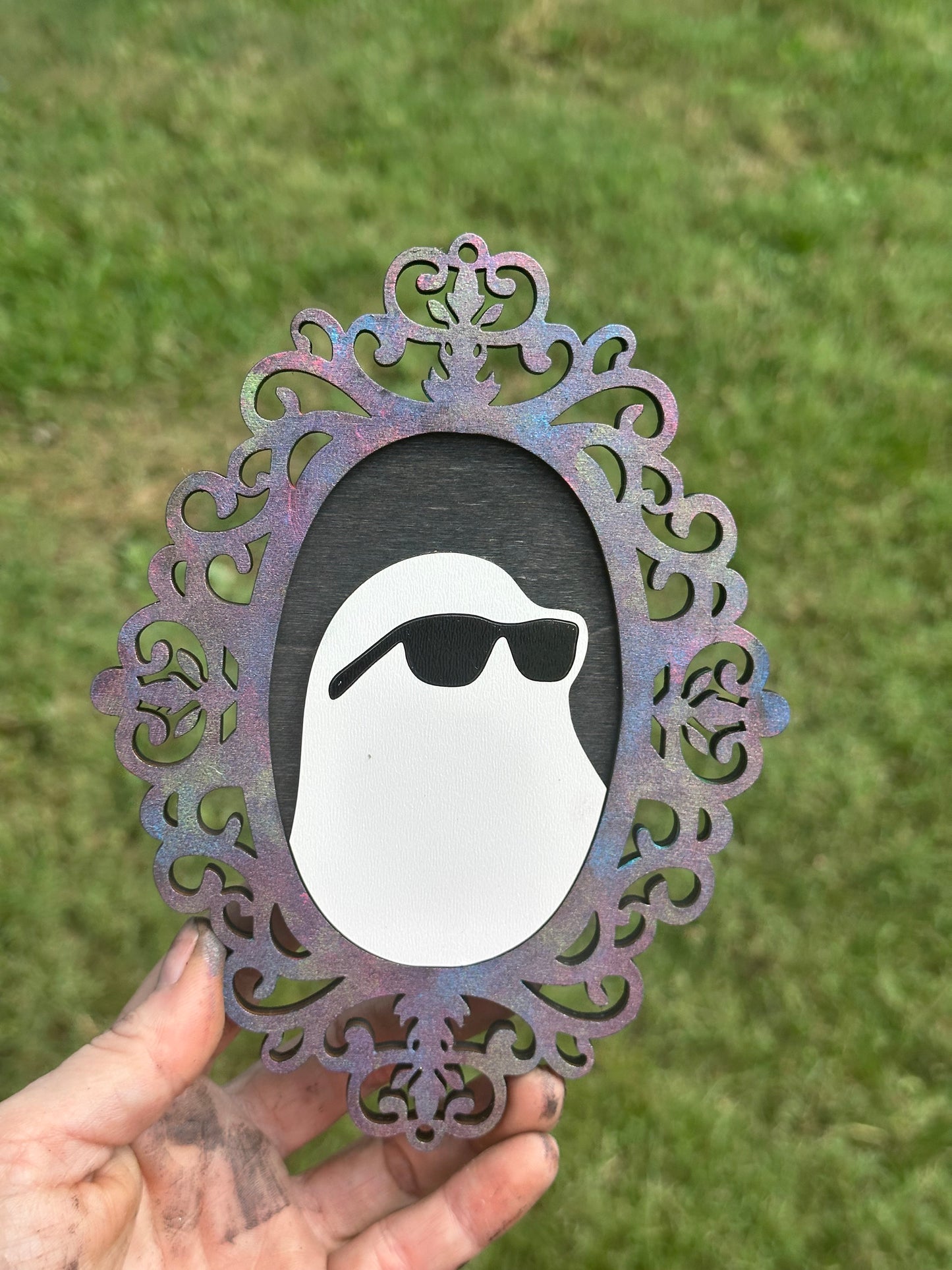 Spooky ghost silhouettes with decorative frames