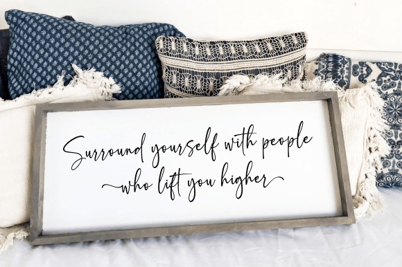 Surround yourself with people who lift you higher framed sign