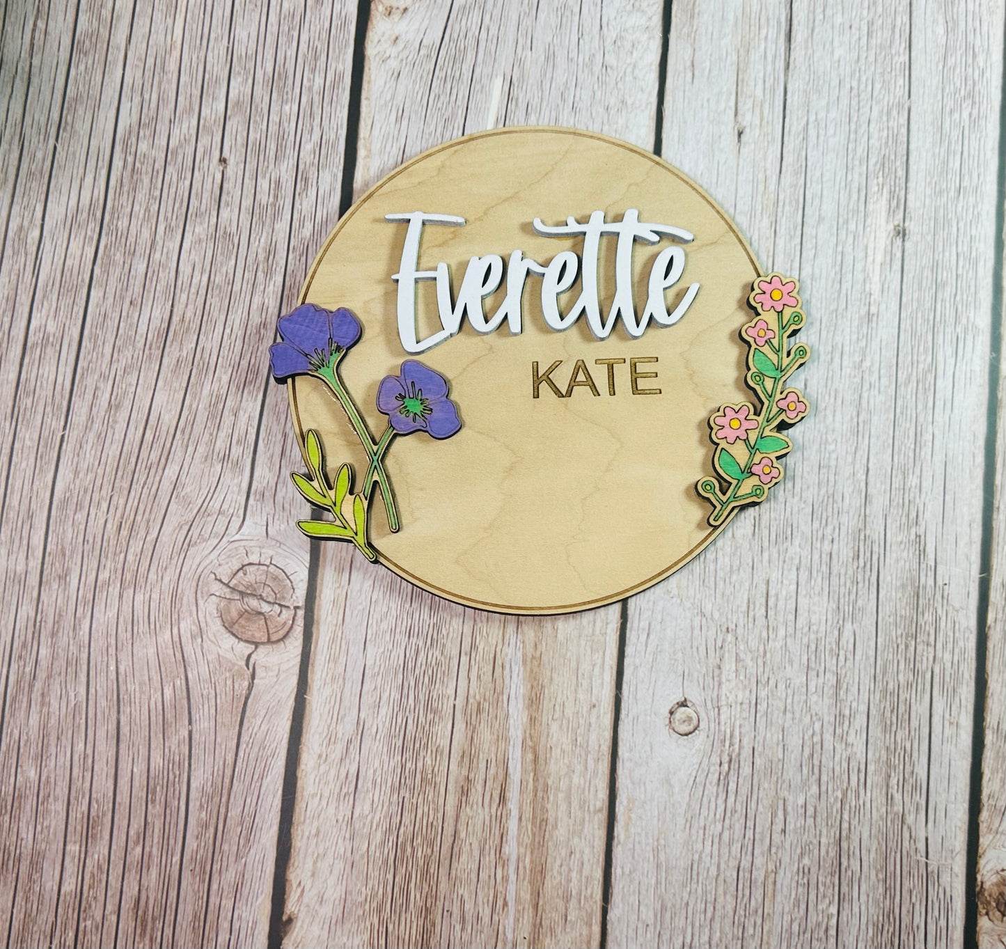 Round raised floral birth announcements