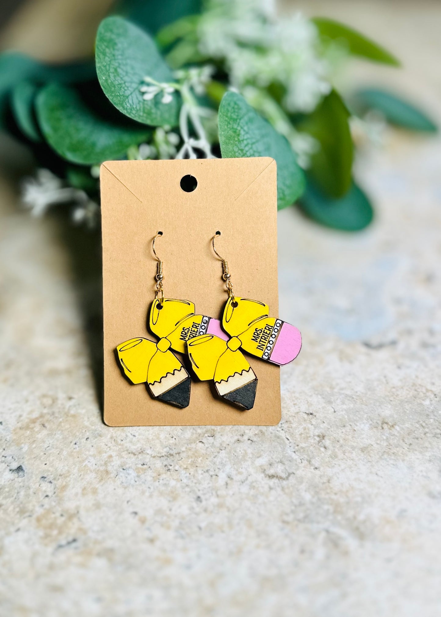 Pencil bow dangle earrings