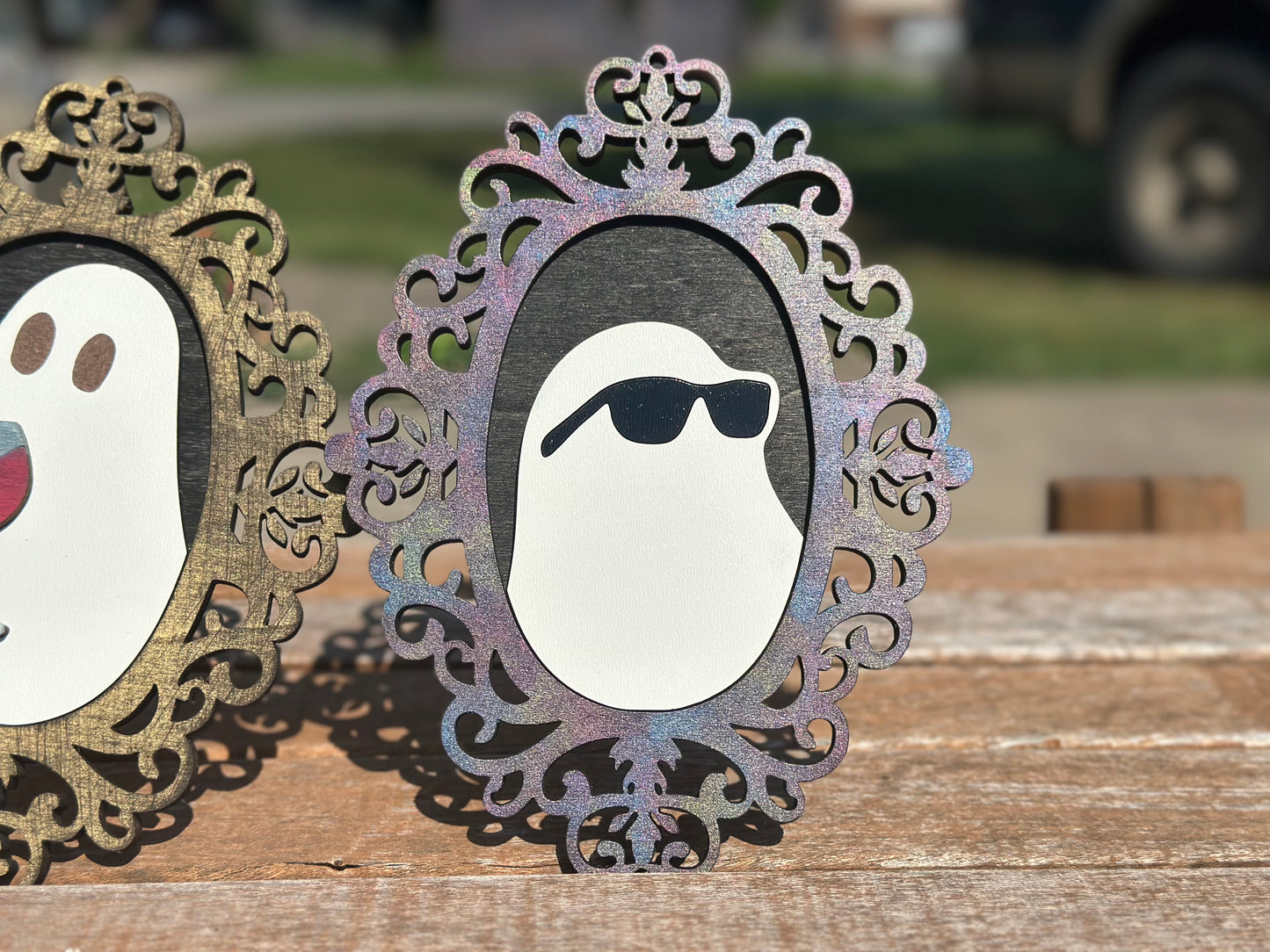 Spooky ghost silhouettes with decorative frames