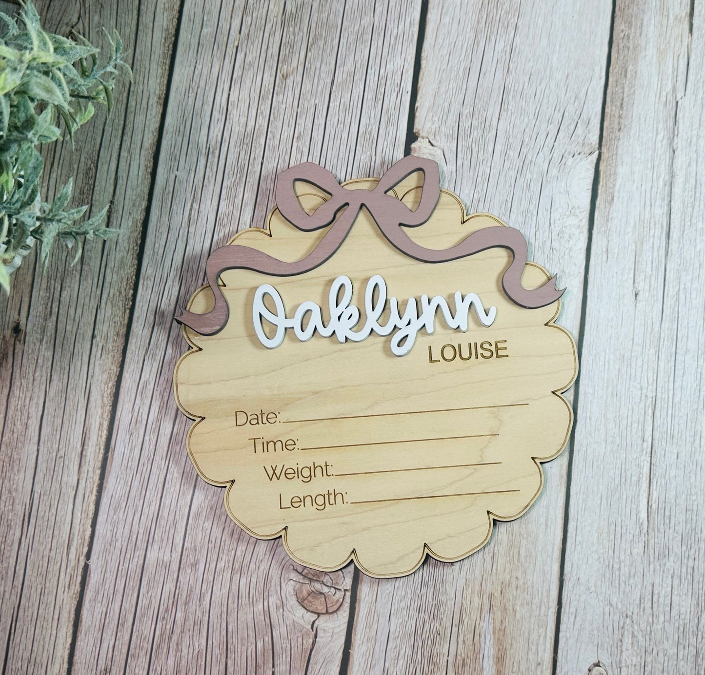 Scalloped round with coquette bow birth stat announcement