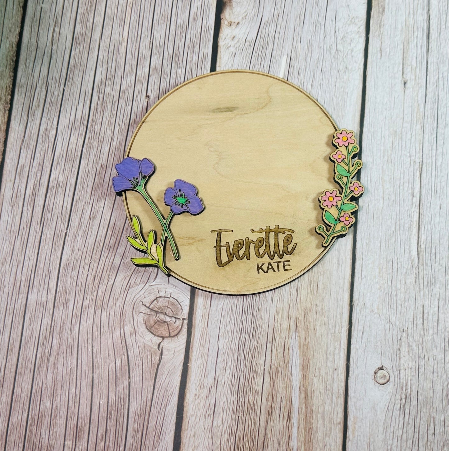 Round raised floral birth announcements