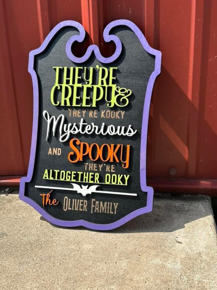 Addams family plaque