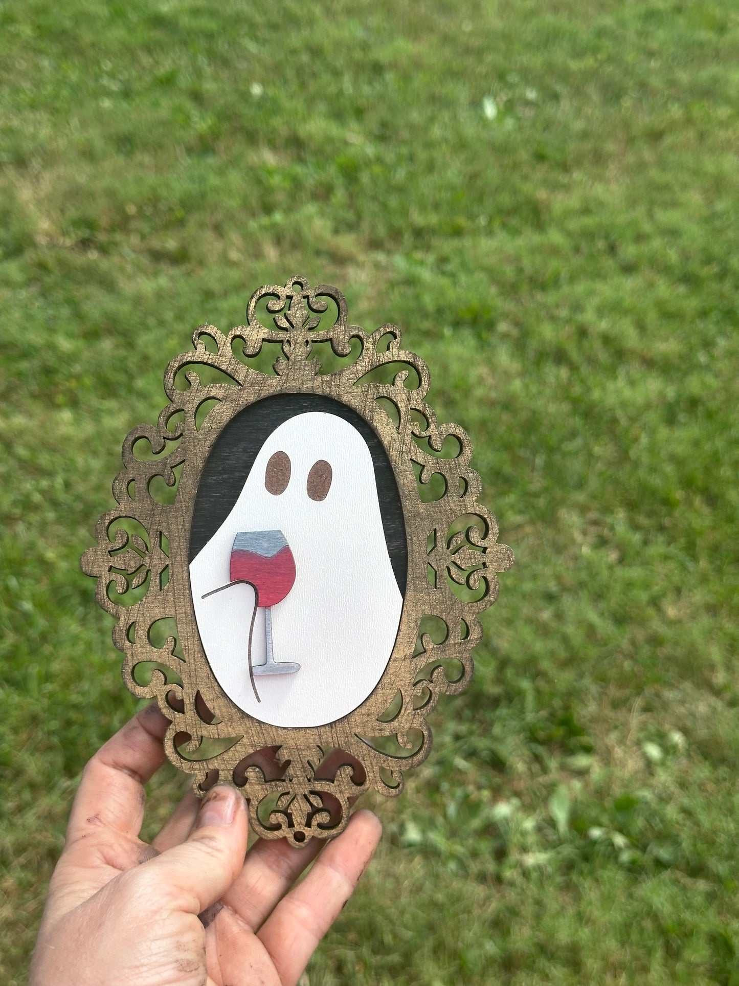 Spooky ghost silhouettes with decorative frames