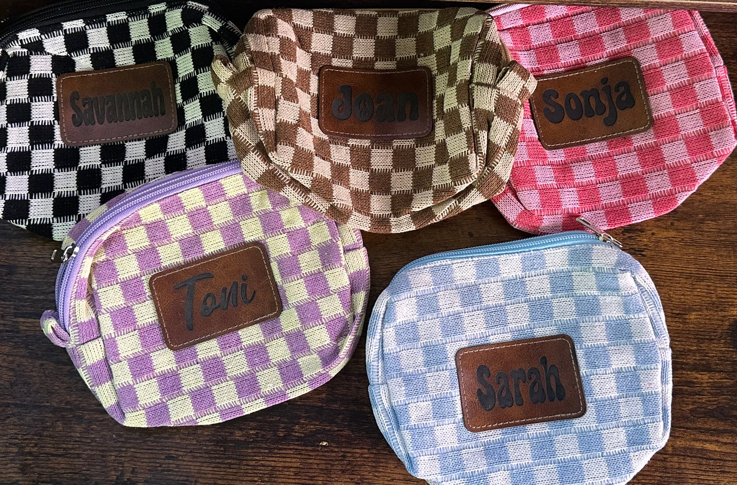 Checkered print bag with custom leather patch