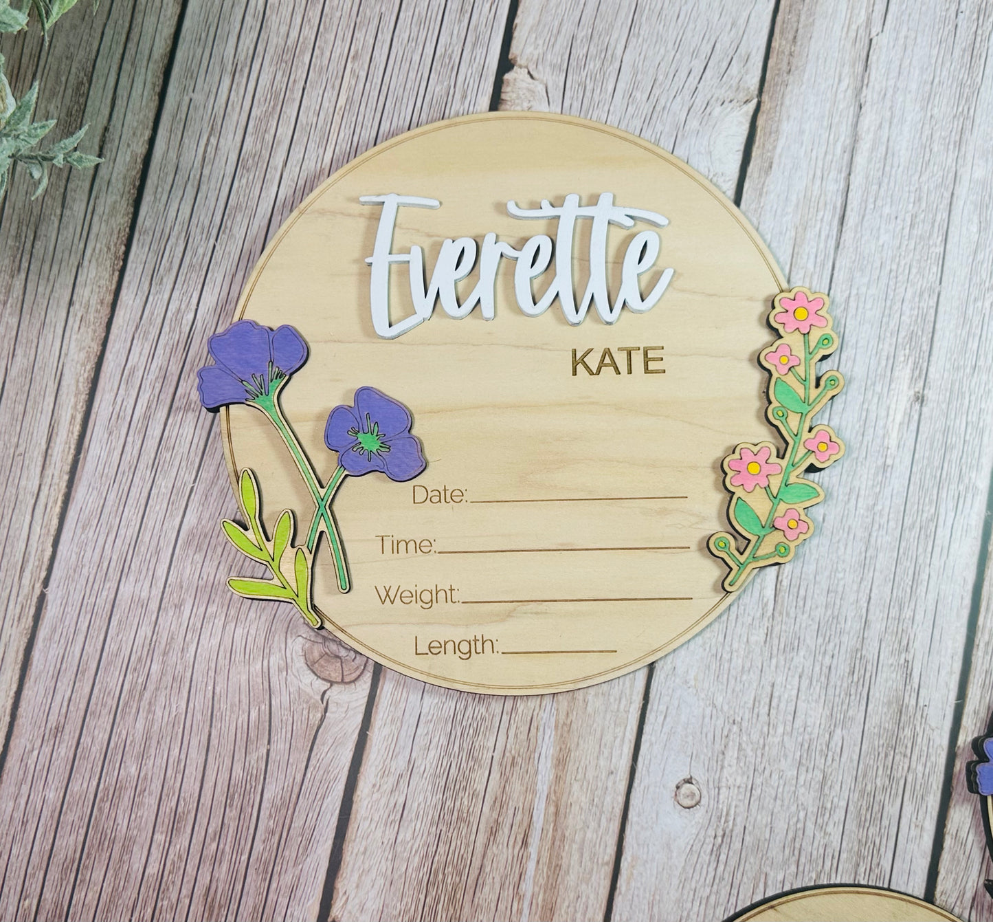 Round raised floral birth announcements