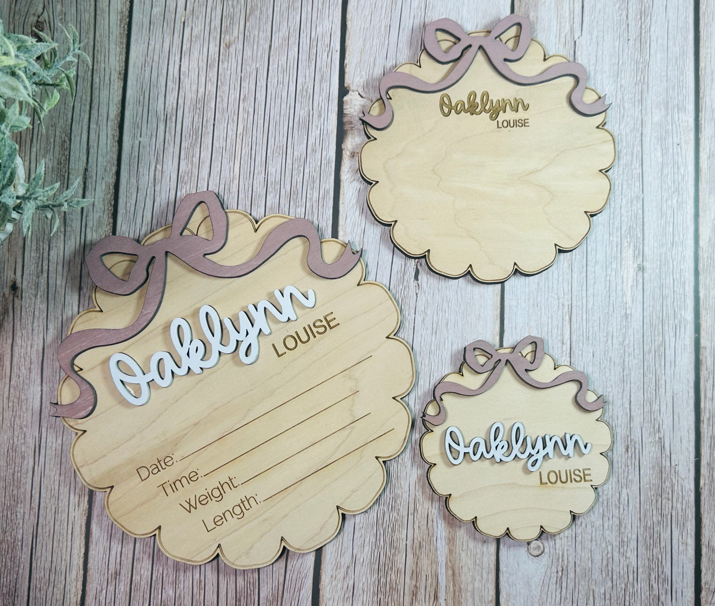 Scalloped round with coquette bow birth stat announcement