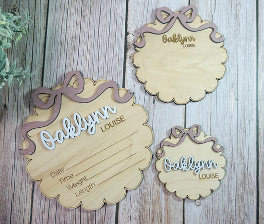 Scalloped round with coquette bow birth stat announcement