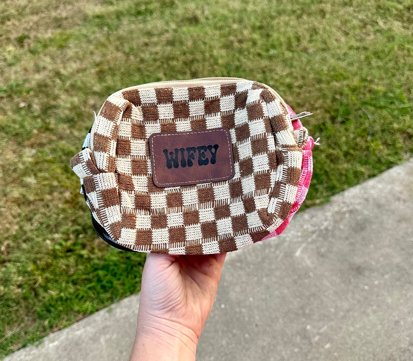 Checkered print bag with custom leather patch