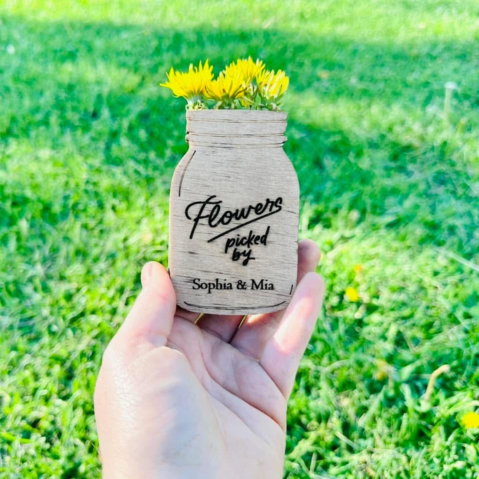 Flowers picked by fridge magnet