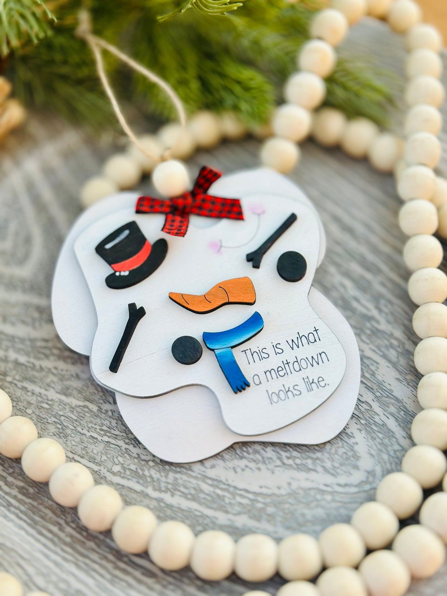 Meltdown snowman ornament