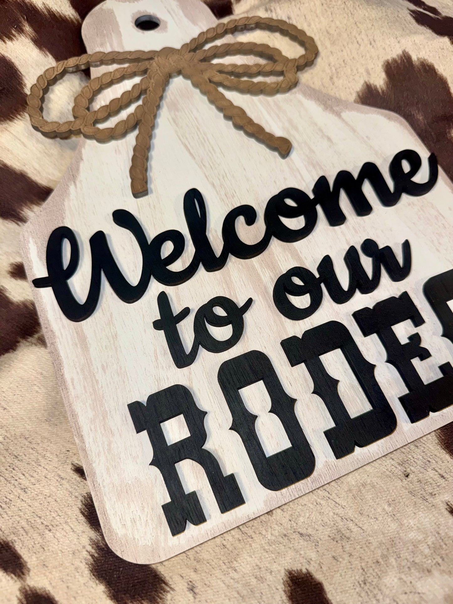 Welcome to our rodeo cow tag wall sign