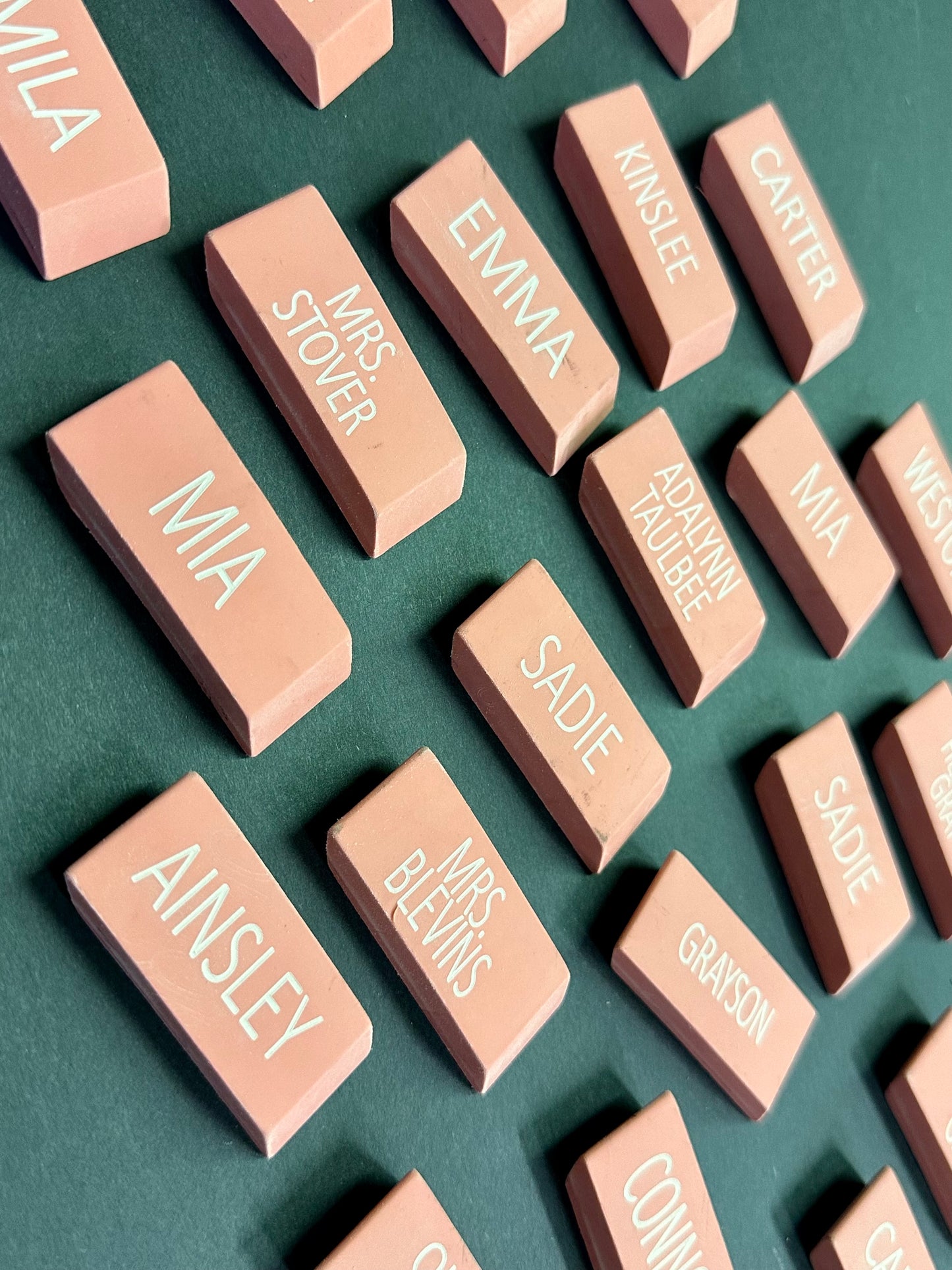 Personalized engraved pink erasers