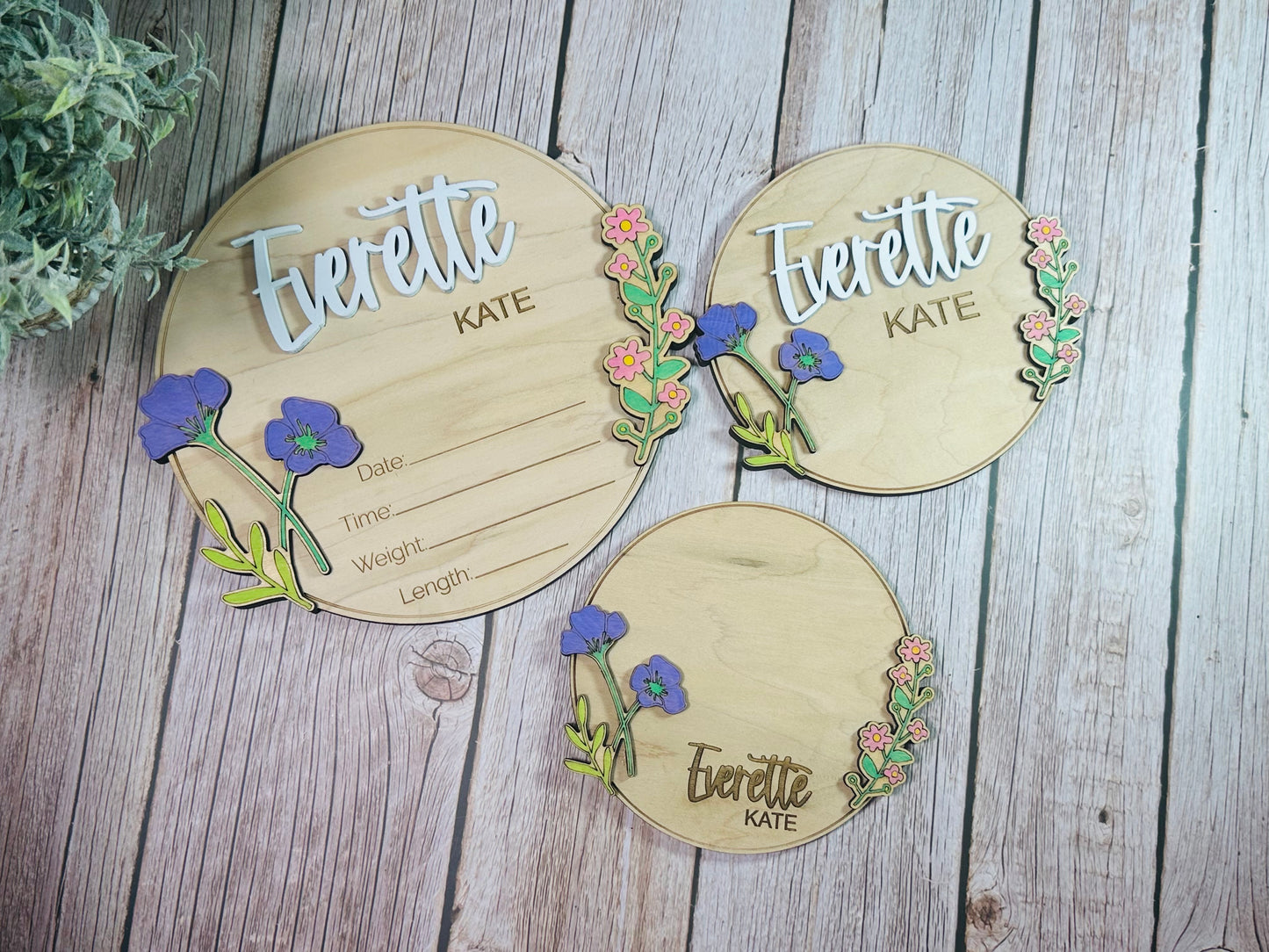Round raised floral birth announcements