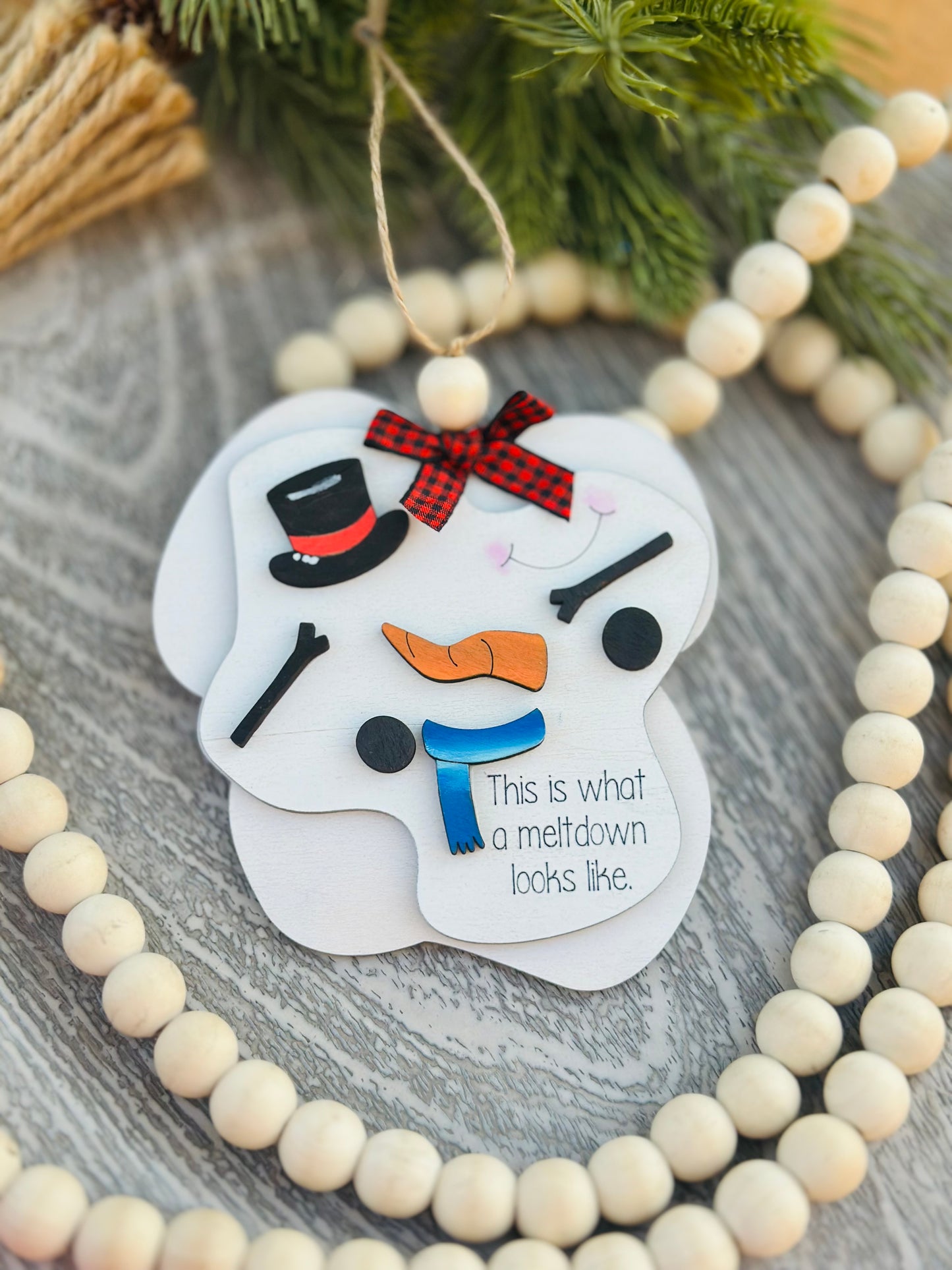 Meltdown snowman ornament