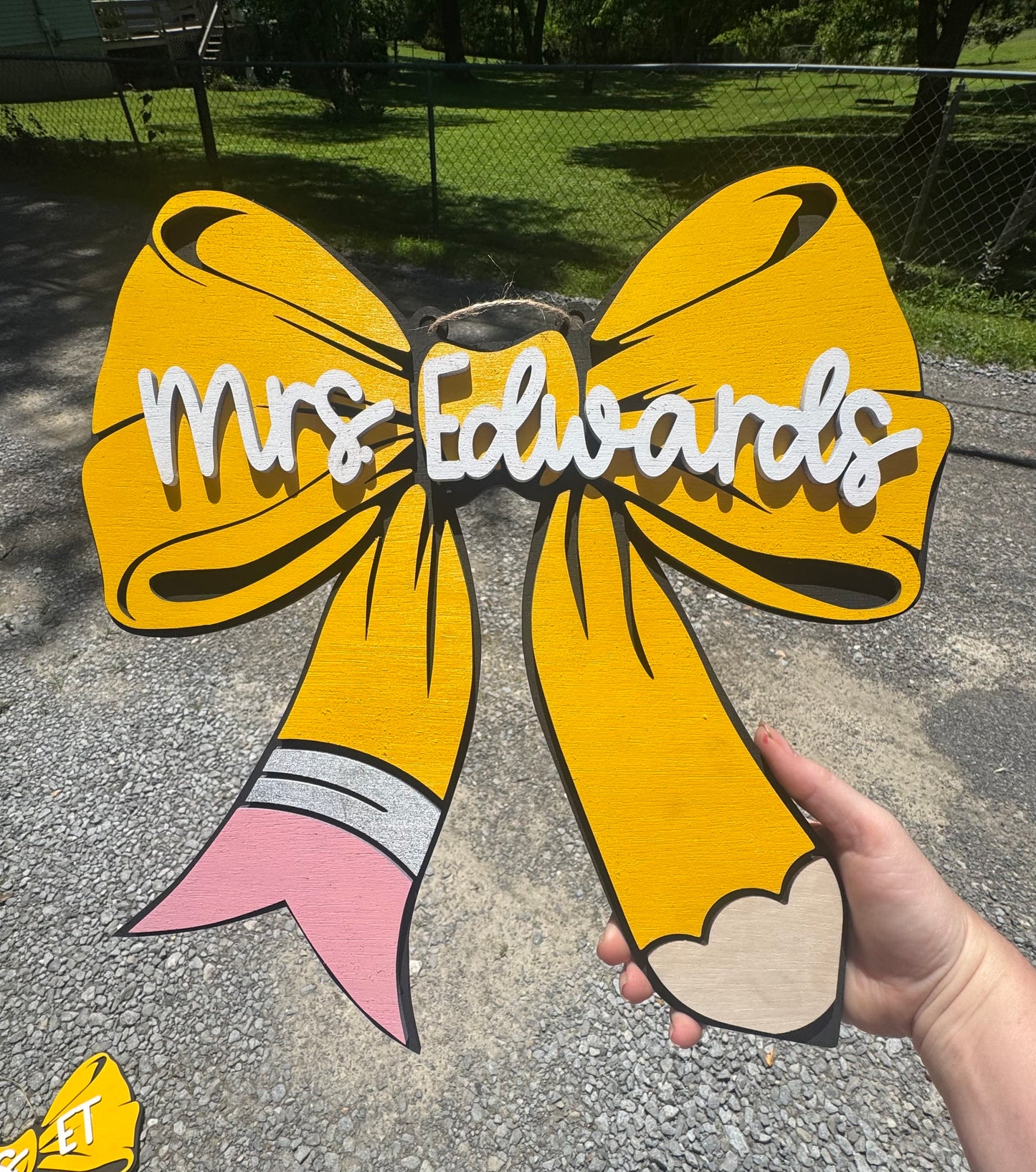 Pencil bow door hanger