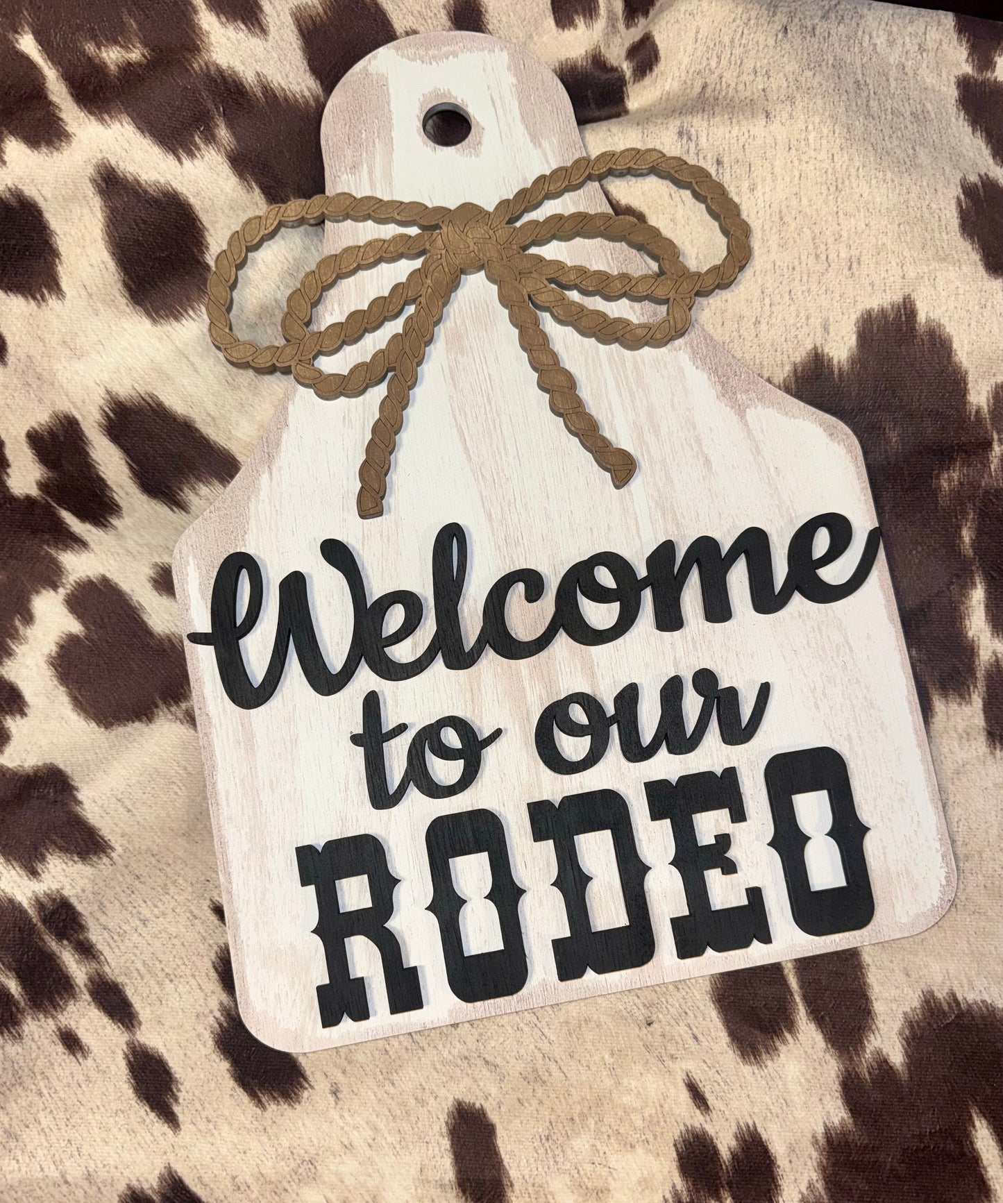 Welcome to our rodeo cow tag wall sign