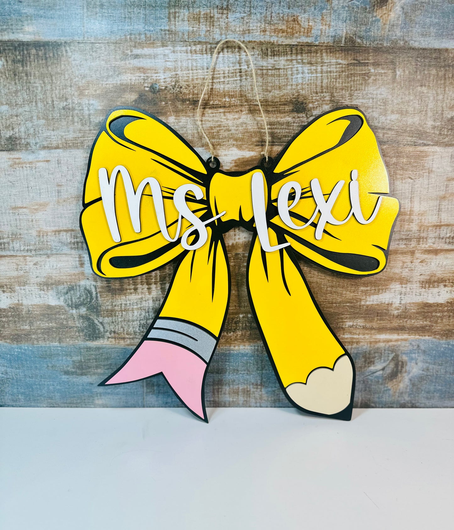 Pencil bow door hanger